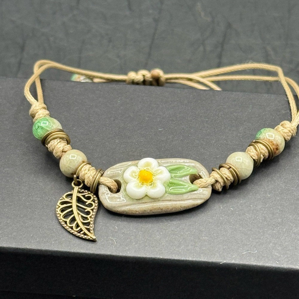 Handmade Adjustable Floral Bracelet with Leaf Pendant